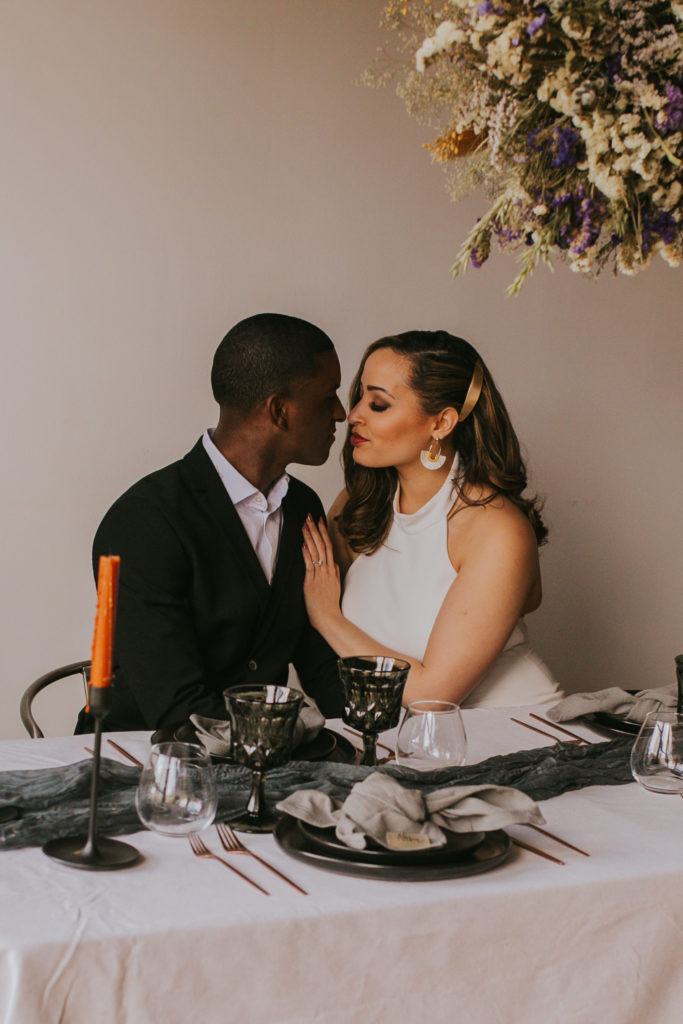 interracial couple having dinner after their Washington State elopement