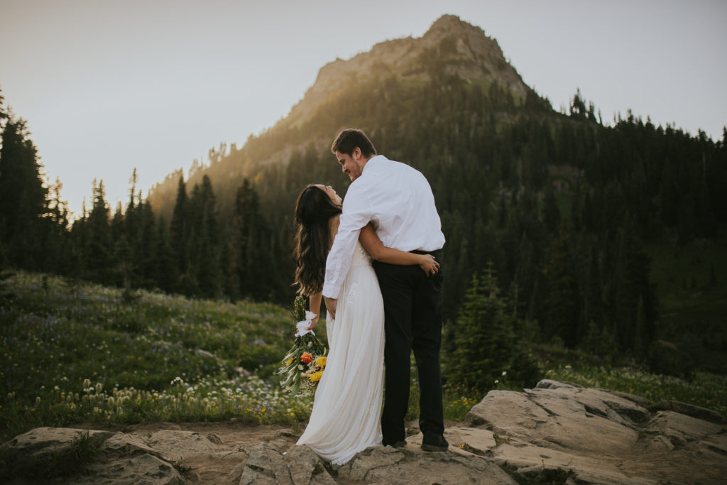 just married couple hugging in nature in Washington